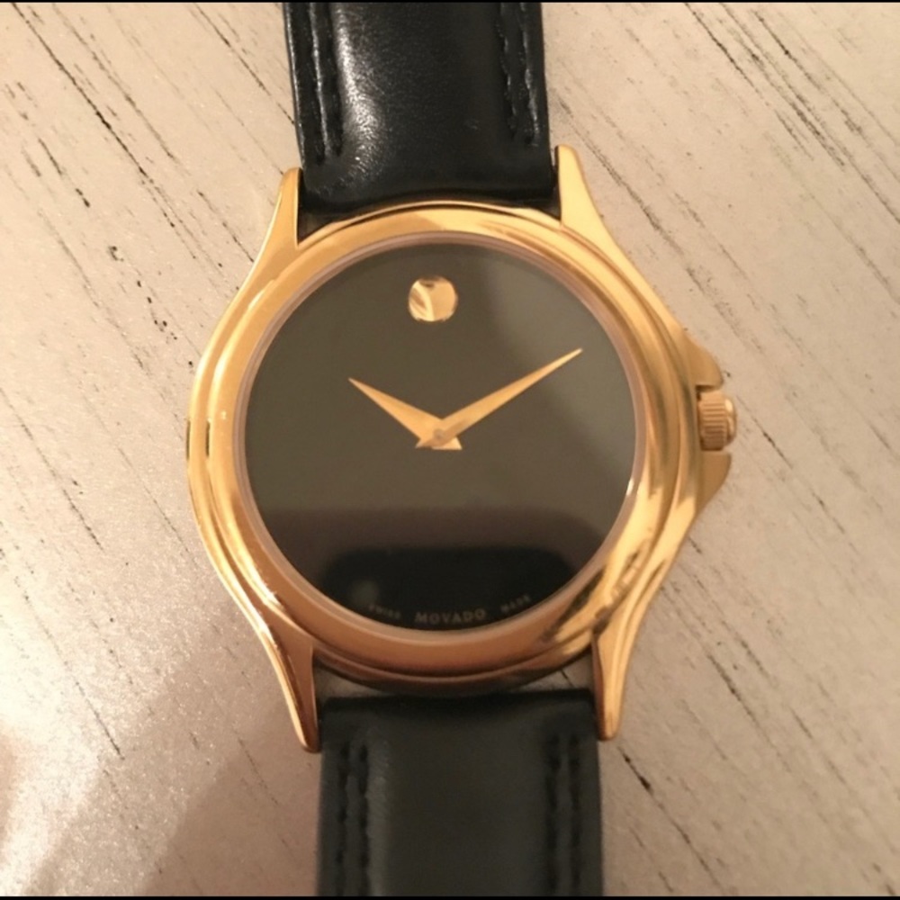 Movado black leather, black and gold face watch